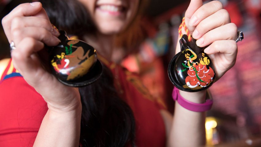 Gisselle Riestra-Vidal, 37, shows off her castanets at Tapas and Tintos, a restaurant in Miami Beach, Fla. where fans gathered to watch Spain take on Russia during the 2018 FIFA World Cup Round of 16 knockout stage on Sunday, July 1, 2018. After the score being tied 1-1 at the end of extra time, Russia won, 4 penalty kicks to 3. (Ellis Rua/Miami Herald/Tribune News Service via Getty Images)